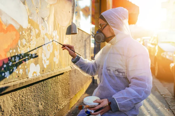 Young Graffiti Artist Painting Mural Outdoors Street Wall — 스톡 사진