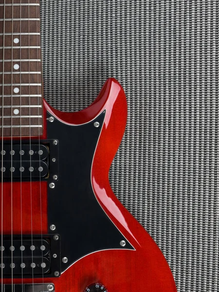 Red Guitar and amplifier background. This file is cleaned, retouched and is ready to use.