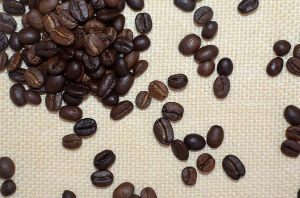 Högen Kaffebönor Naturliga Linne Bakgrund Ovanifrån — Stockfoto