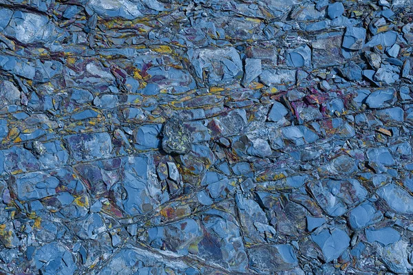 異なる色の鉱物と山の石の表面の質感 コンセプト背景 テクスチャ — ストック写真