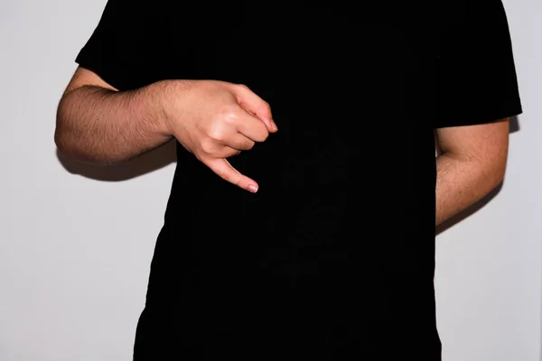 Young sign-language interpreter, showing a "J" in American Sign Language — Stock Photo, Image