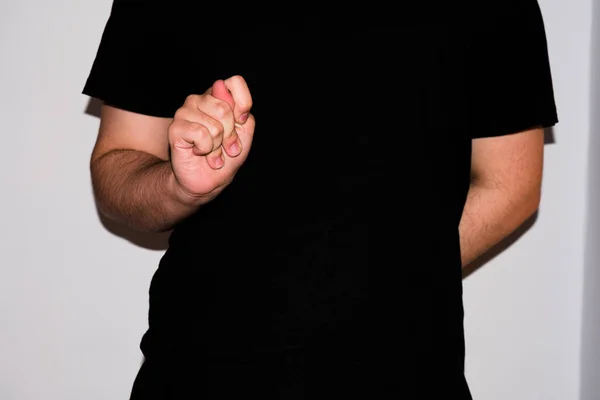 Young sign-language interpreter, showing a T in American Sign Language — 스톡 사진