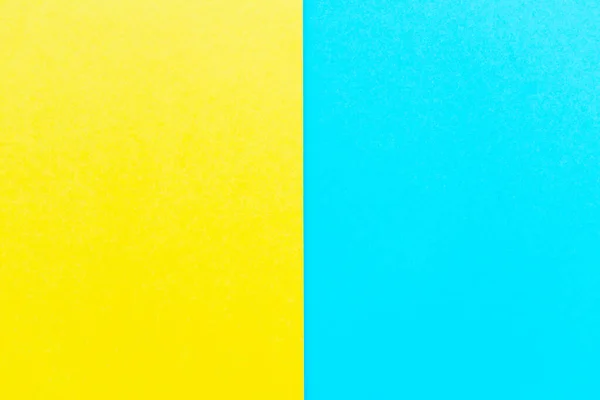 Hemelsblauwe Felgele Kartonnen Achtergrond Met Een Verticale Scheiding Geel Links — Stockfoto