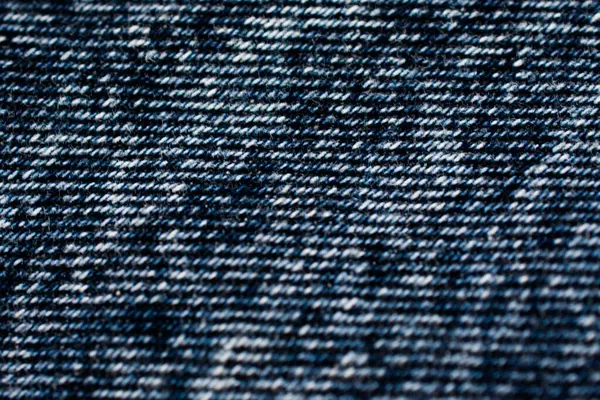 Zbliżenie Ciemnej Tekstury Jeansowej Nitkami Poruszającymi Się Poziomo — Zdjęcie stockowe
