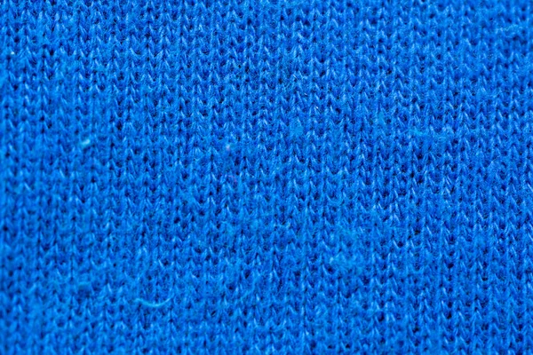 Tło Niebieskiego Wzoru Tkaniny Elektrycznej Nitkami Sięgającymi Dołu Zbliżenie — Zdjęcie stockowe