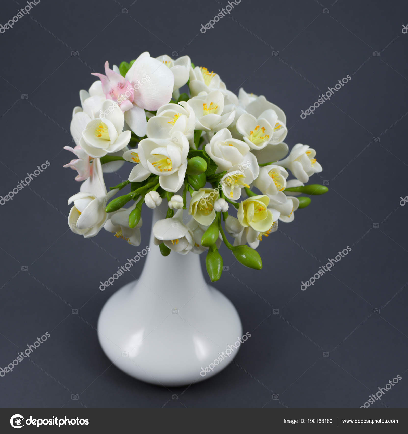 Polymer Clay Flower Bouquet In A White Vase On A Gray Background