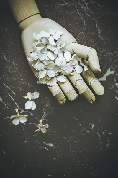 Flower Petals In Wooden Hand — Stock Photo, Image