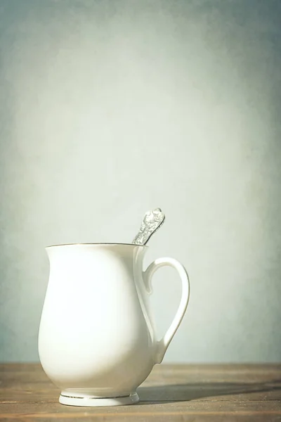 Kaffekopp med sked — Stockfoto