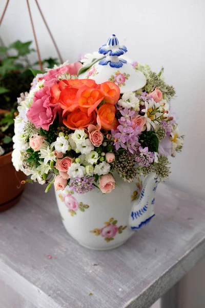 Flowers arrangement. Flowers arrangement for special events in a pottery bowl.