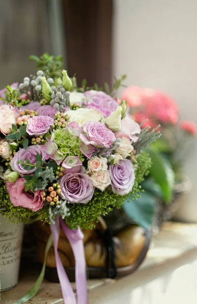 Pink roses bouquet for wedding. Roses bouquet closeup view for wedding event.