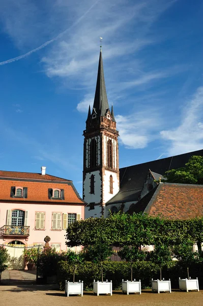 Catholic church architecture. Photo of St. Elisabeth catholic church in Darmstadt, Germany against blue sky in the background.