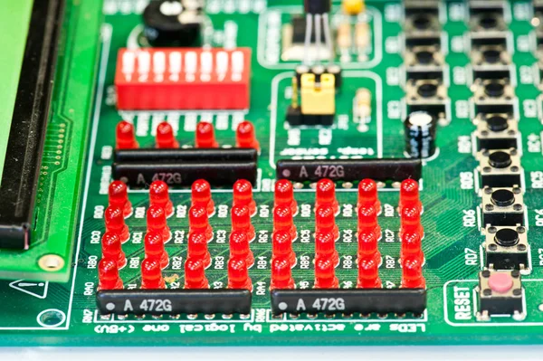Small leds for circuit board. Red leds on the circuit board with components.