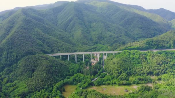 Italy, Province of La Spezia, A12. European route E80 (Trans-European Motorway or TEM). Mountain section with bridges and tunnels. 4K — Stock Video