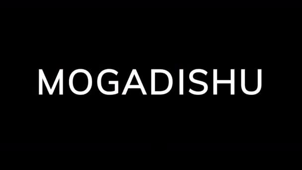 Från Glitch effekten uppstår storstaden Mogadishu. Sen stängs TV:n av. Alfakanal Förmultiplicerad - Mattad med färg svart — Stockvideo