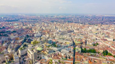 Milan, Italy. Roofs of the city aerial view. Spiers Milan Cathedral. Cloudy weather., Aerial View 