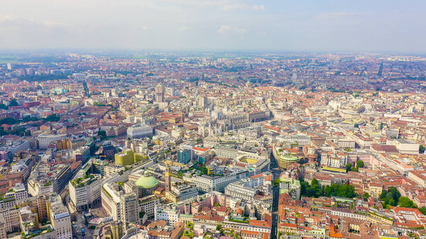 Milan, Italy. Roofs of the city aerial view. Spiers Milan Cathedral. Cloudy weather., Aerial View