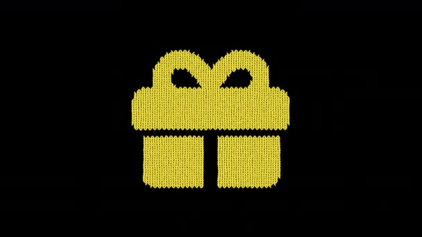 Cadeau symbole est tricoté à partir d'un fil de laine. Tricoter comme un pull — Video