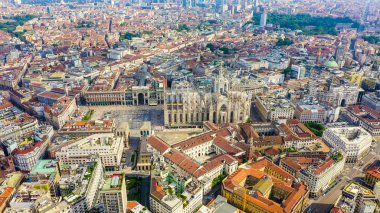 Milan, Italy. Roofs of the city aerial view. Spiers Milan Cathedral. Cloudy weather., Aerial View 