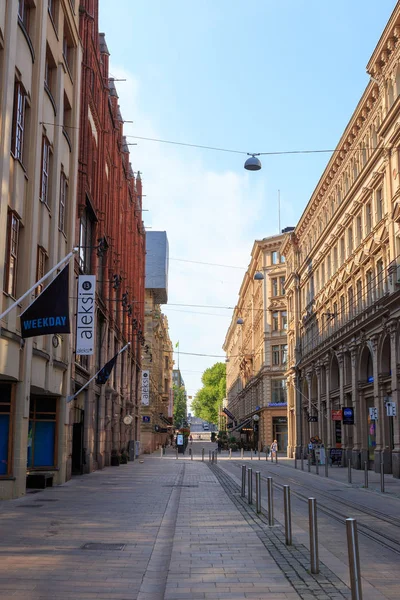 Helsinki, Finland - June 21, 2019: Street with signboards in the — Stock Photo, Image