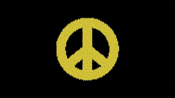 Symbol peace is knitted from a woolen thread. Knit like a sweater — Stock Video