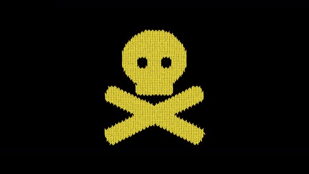 Das Symbol Totenkopf-Kreuzknochen ist aus einem Wollfaden gestrickt. Stricken wie ein Pullover — Stockvideo