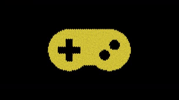 Symbol gamepad is knitted from a woolen thread. Knit like a sweater — Stock Video