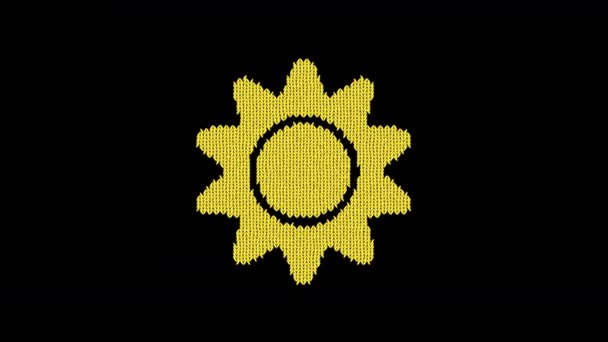 Symbol sol stickas från en ulltråd. Sticka som en tröja — Stockvideo