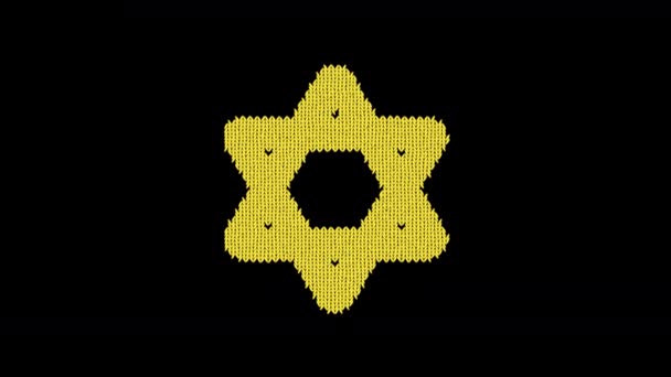 Symbole étoile de David est tricoté à partir d'un fil de laine. Tricoter comme un pull — Video