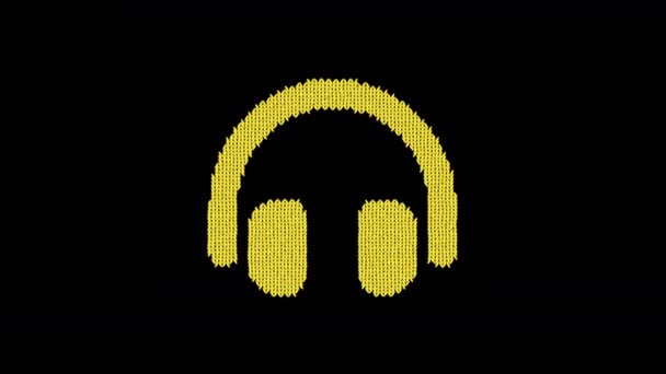 Symbol headphones is knitted from a woolen thread. Knit like a sweater — Stock Video