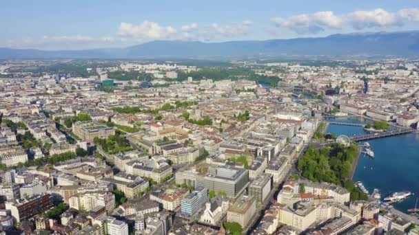 Geneva, Switzerland. Flying over the central part of the city in the morning hours. 4K — Stock Video