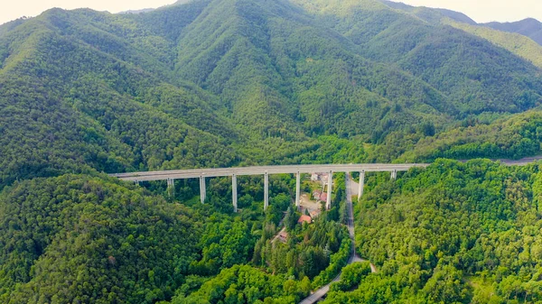 Italy, Province of La Spezia, A12. European route E80 (Trans-European Motorway or TEM). Mountain section with bridges and tunnels, Aerial View — Stock Photo, Image