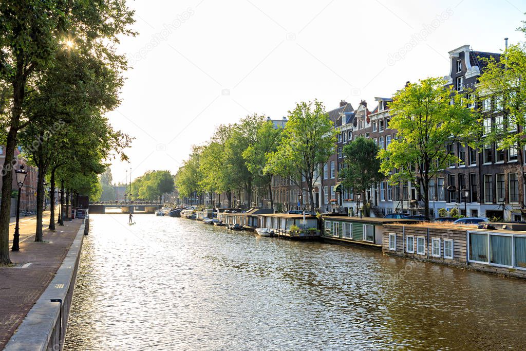 Amsterdam, Netherlands. A man is engaged in SUP (Stand Up Paddle
