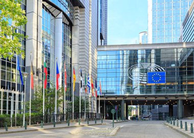 Brussels, Belgium - July 3, 2019: Flags and the symbol of the Eu