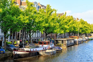 Amsterdam, Netherlands - June 30, 2019: Residential barges and h