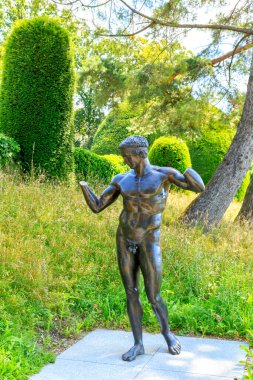 Lausanne, Switzerland - July 13, 2019: Sculpture in the park of the Olympic Museum. Diadumen 