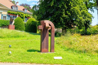Lausanne, Switzerland - July 13, 2019: Park of the Olympic Museum in Lausanne. Bronze sculpture.