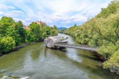 Graz, Austria - July 19, 2019: Island in the Mur - Murinsel is an artificial floating 