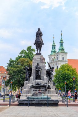 Krakow, Poland - July 21, 2019: Grunwald Monument. In front of the monument is the Tomb of the Unknown Soldier