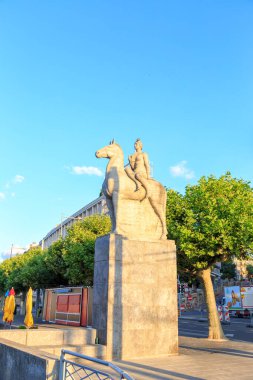 Geneva, Switzerland - July 13, 2019: Sculpture on the quay Le quai Turrettini (Geneve, 1938). architecte: Maurice BRAILLARD