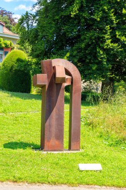 Lausanne, Switzerland - July 13, 2019: Park of the Olympic Museum in Lausanne. Bronze sculpture.