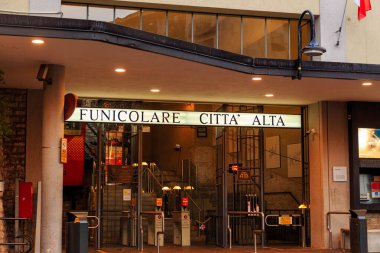 Bergamo, Italy - July 15, 2019: Lower Station Funicolare Bergamo Alta. Viale Vittorio Emanuele II Street. Rainy weather