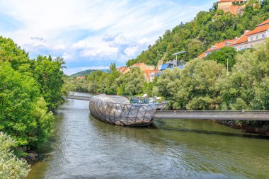Graz, Austria - July 19, 2019: Island in the Mur - Murinsel is an artificial floating 