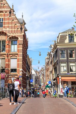 Amsterdam, Netherlands - June 30, 2019: Oude Hoogstraat Street. Amsterdam historic city center in the morning