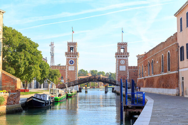 Venice, Italy - July 16, 2019: Ponte del Paradiso. Tower Venice Arsenal (Arsenale di Venezia)