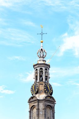 Amsterdam, Netherlands - June 30, 2019: The historic city center. Old houses of the city. Munttoren Tower