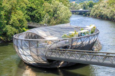 Graz, Austria - July 19, 2019: Island in the Mur - Murinsel is an artificial floating 