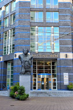 Netherlands, The Hague - July 1, 2019: Muzentoren is an office building in Resident, a modern part of the center of The Hague.