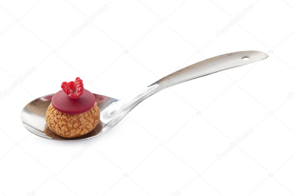 Chou pop on a spoon isolated on white backgraound
