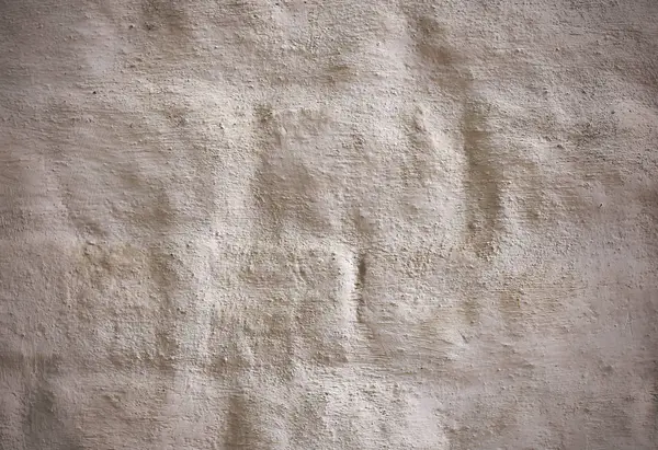 Antico muro di mattoni bianchi con uno spesso strato di intonaco — Foto Stock