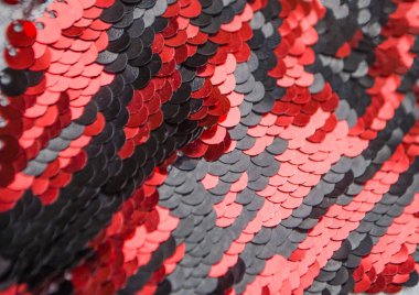 Kırmızı ve siyah parıltılı arkaplan.